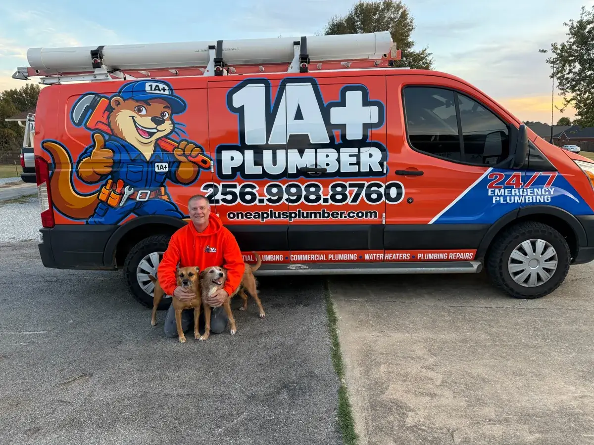 Eric Walts with his dogs beside the newly wrapped 1 A+ Plumber service van